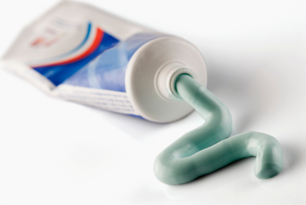 Toothpaste squeezed out from a toothpaste tube
